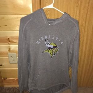 Minnesota Vikings sweatshirt.